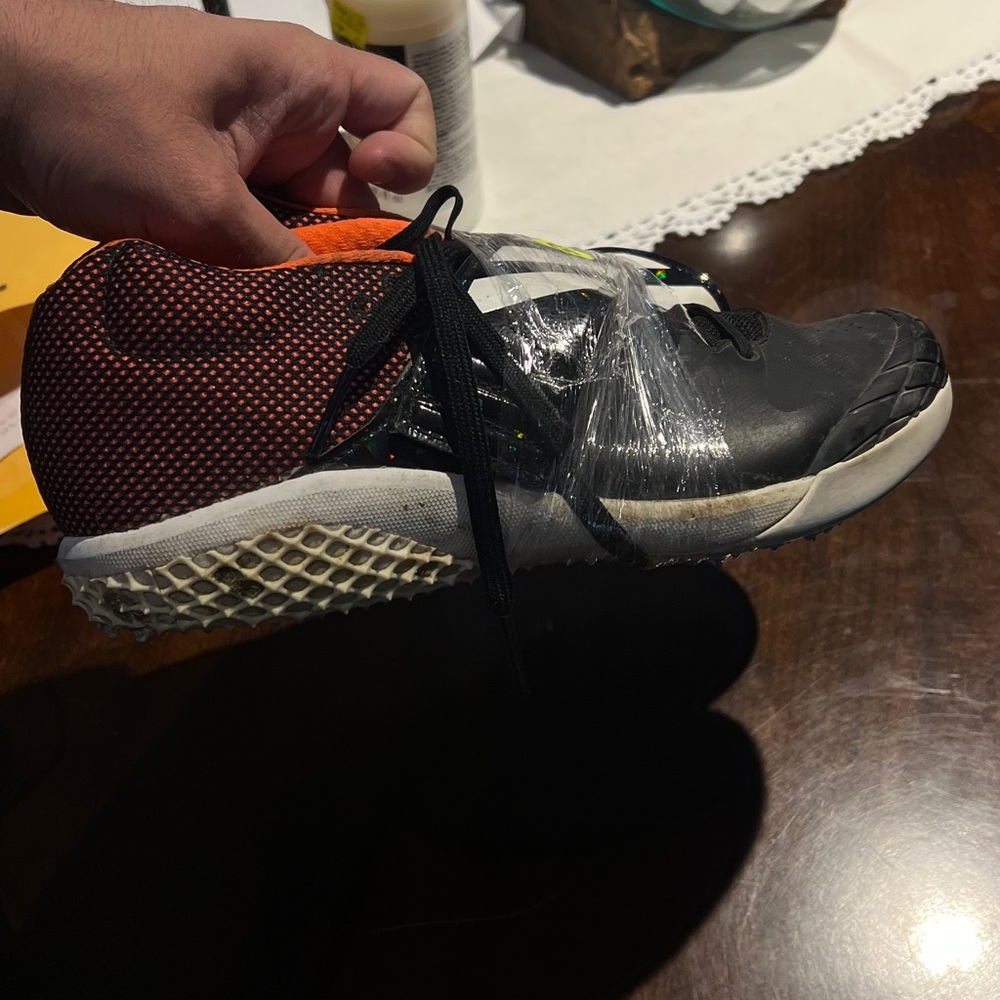Black and Orange Adidas Women’s Javelin Shoes Size 8